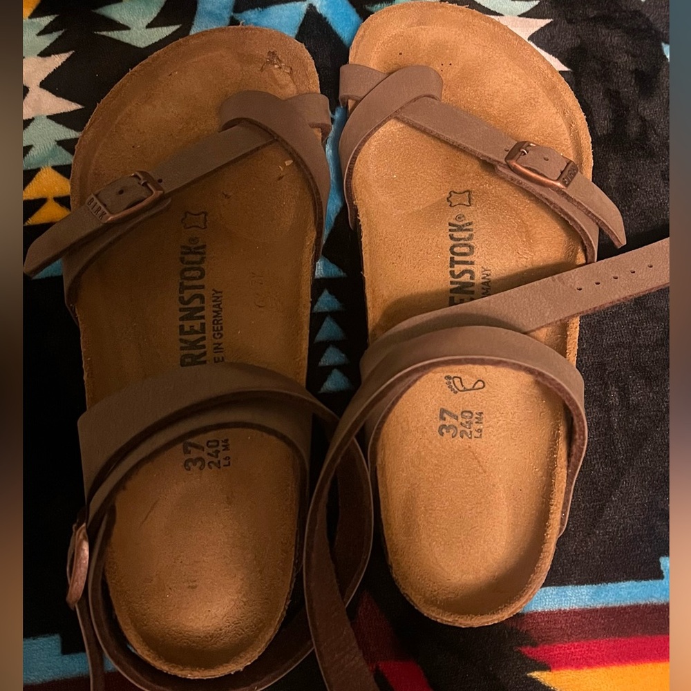 Never worn size 37 240 L6 M4 Birkenstocks. Cute wrap around ankle. Never worn.